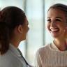 Happy patient receiving posture check